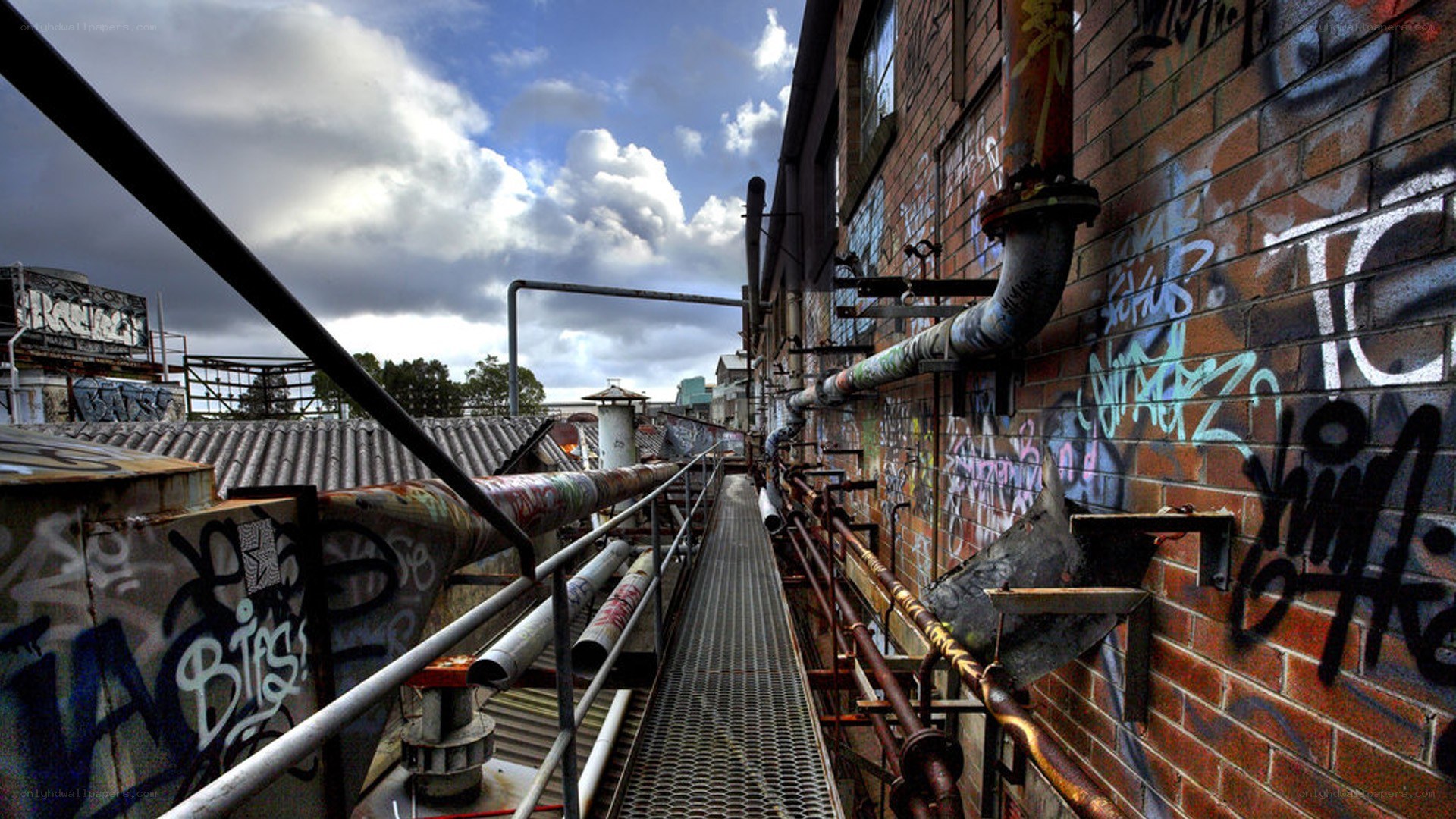 graffiti-covered industrial walkway