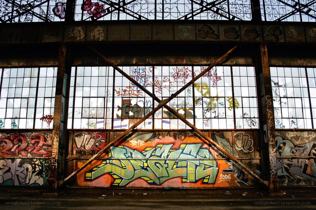 graffiti-covered industrial window