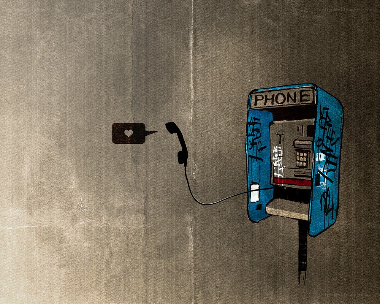 graffiti-covered payphone
