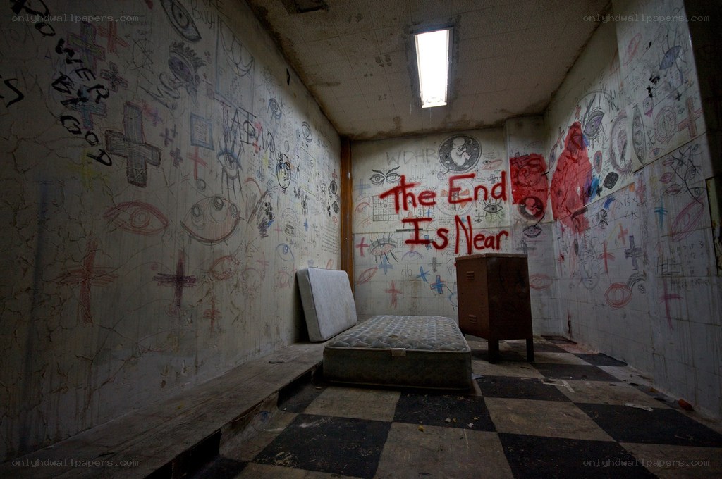 graffiti-covered prison cell