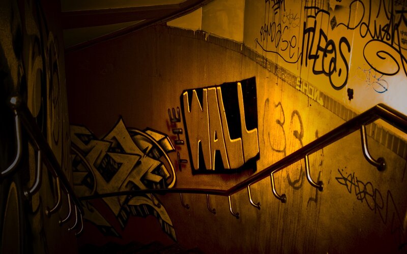 Graffiti-covered Stairwell — Yellow