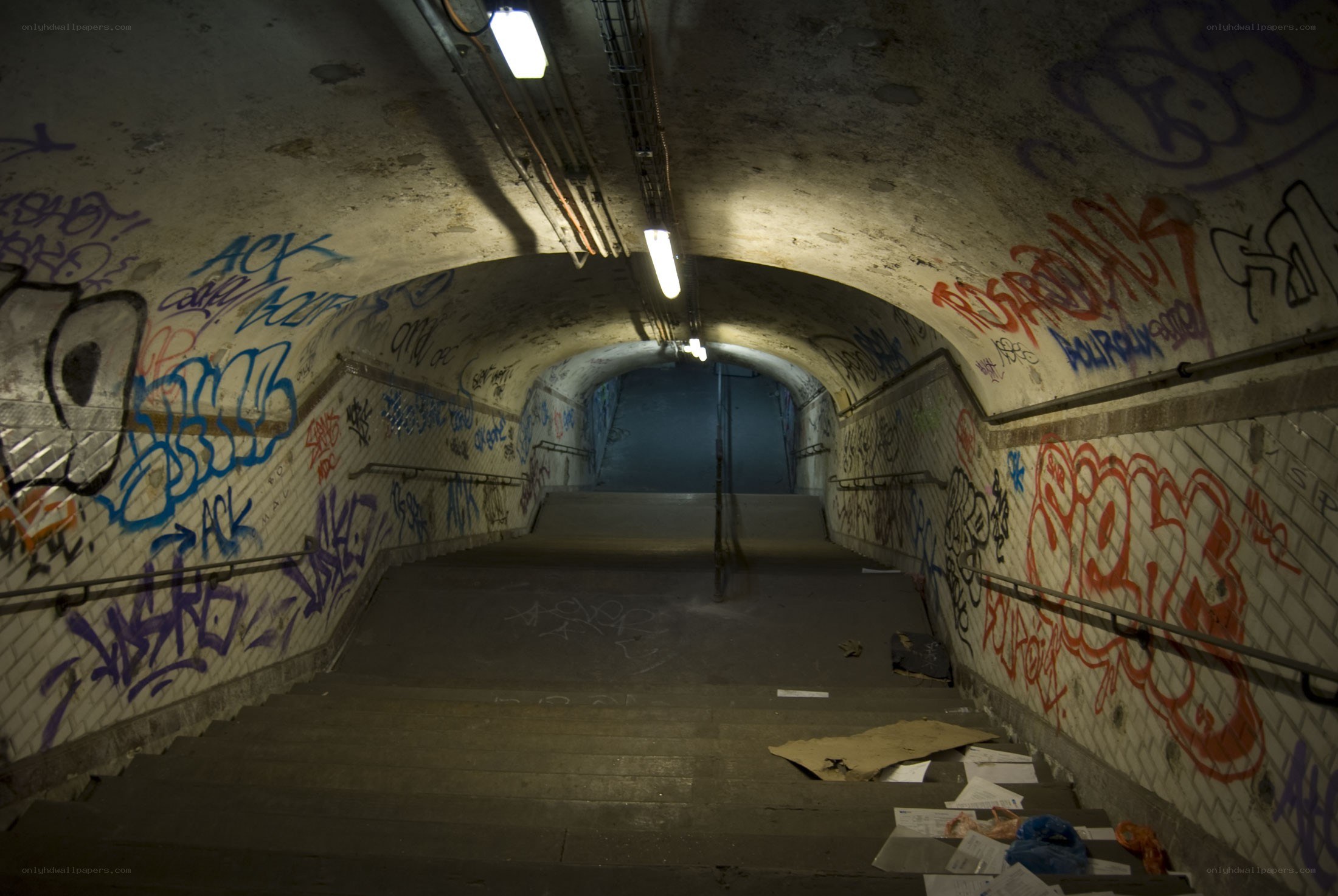 graffiti-covered subway tunnel