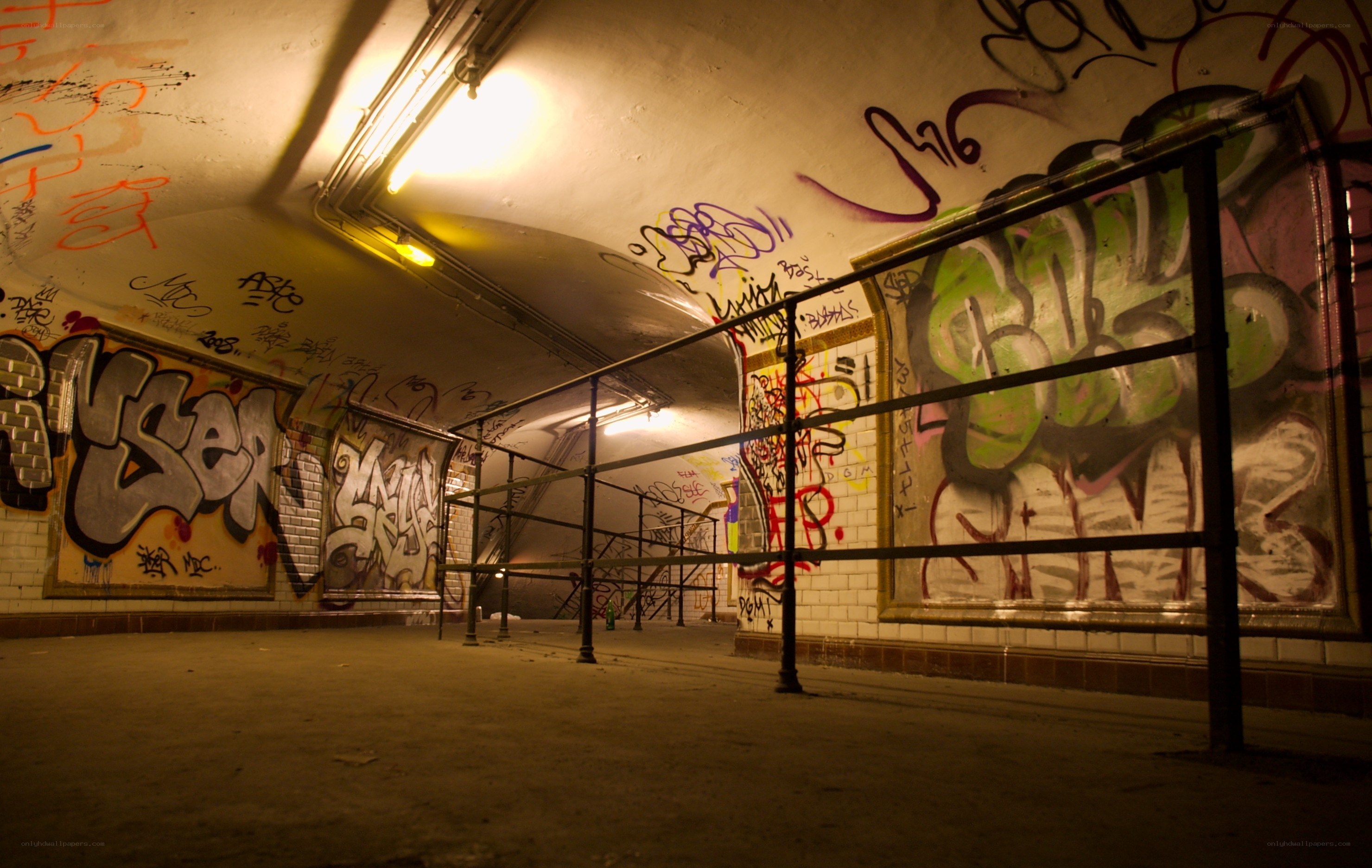 graffiti-covered subway tunnel