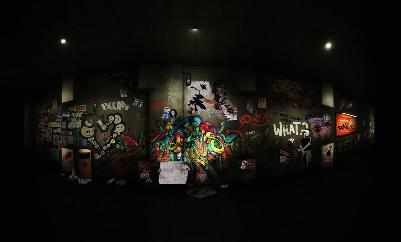 graffiti-covered subway wall