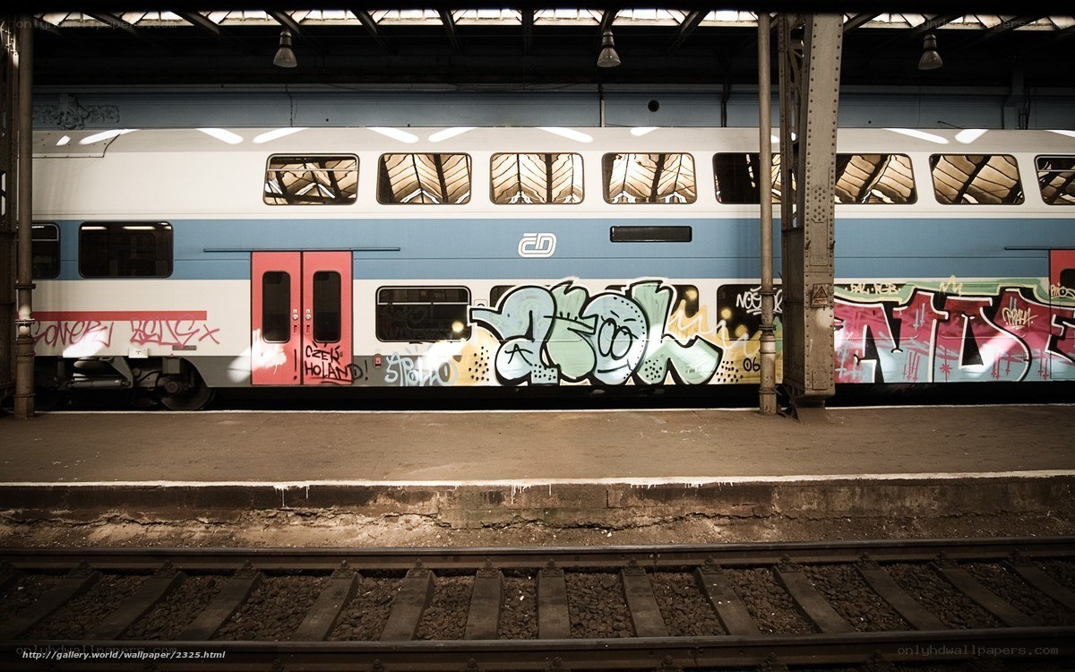 Graffiti-covered train at station