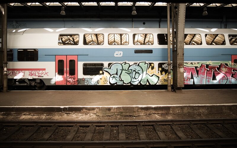 Graffiti-covered Train — Blue, Dramatic