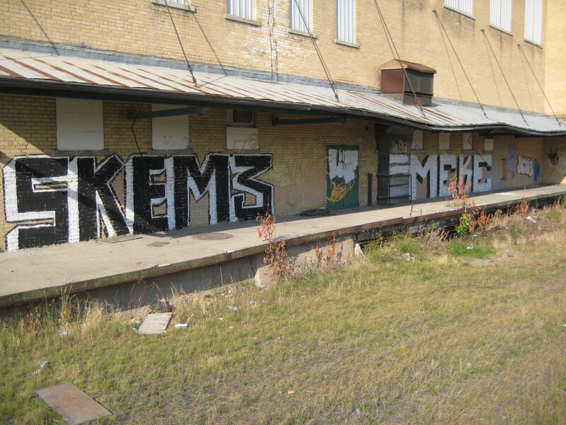 graffiti-covered train station
