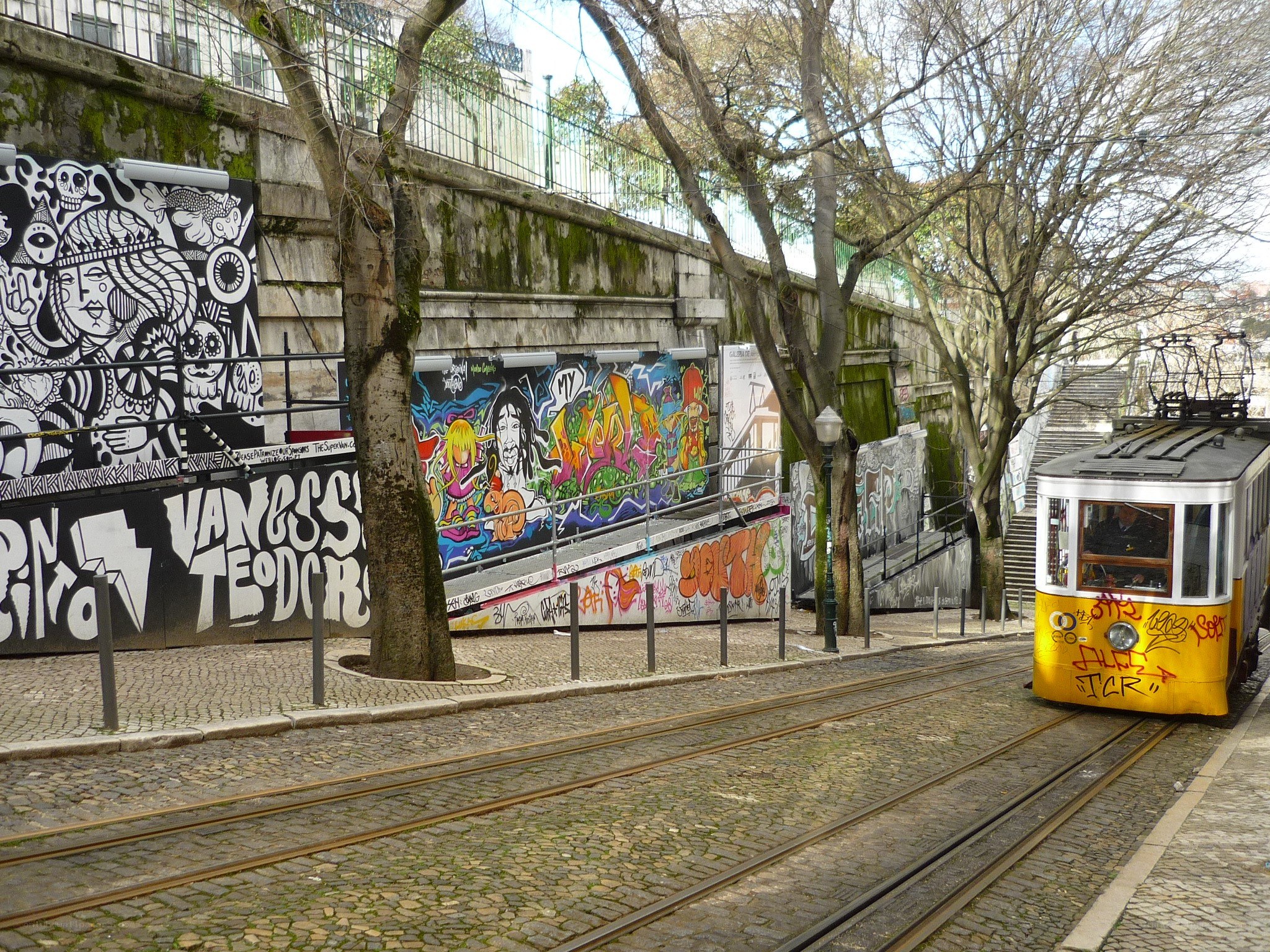 Graffiti-covered tram in Lisbon