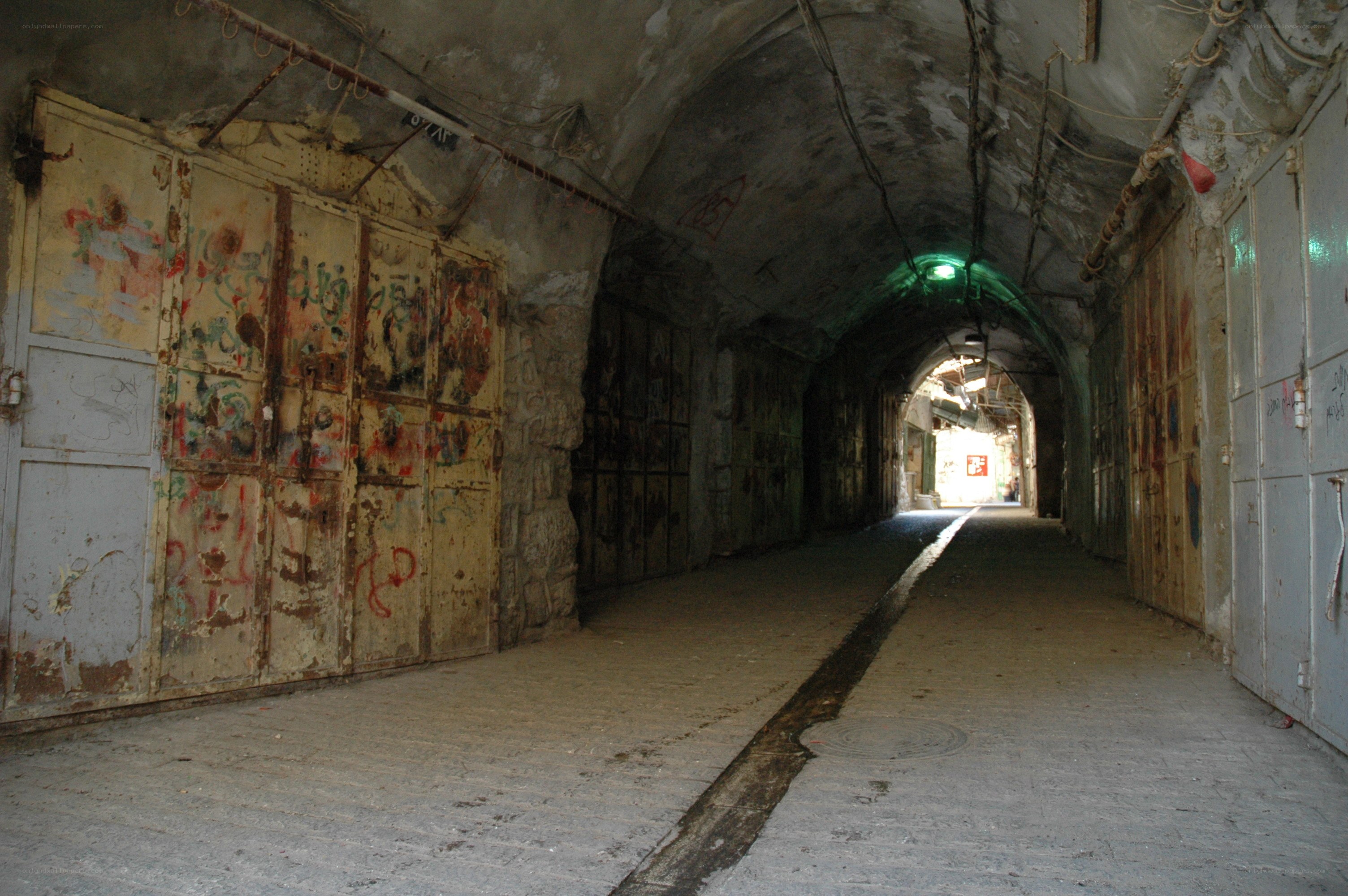 graffiti-covered tunnel