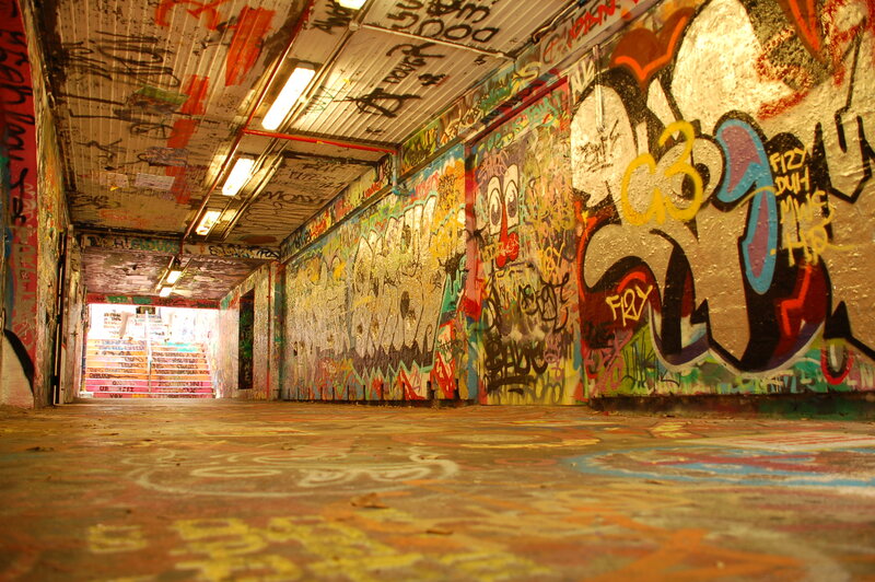 graffiti-covered tunnel