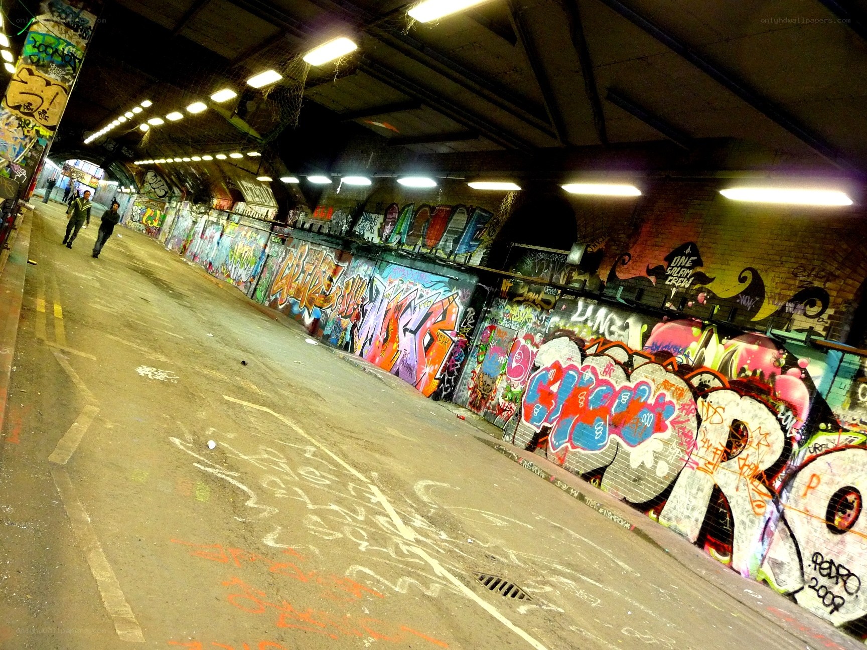 graffiti-covered underpass