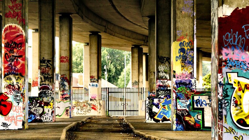 Graffiti-covered Underpass — Gray