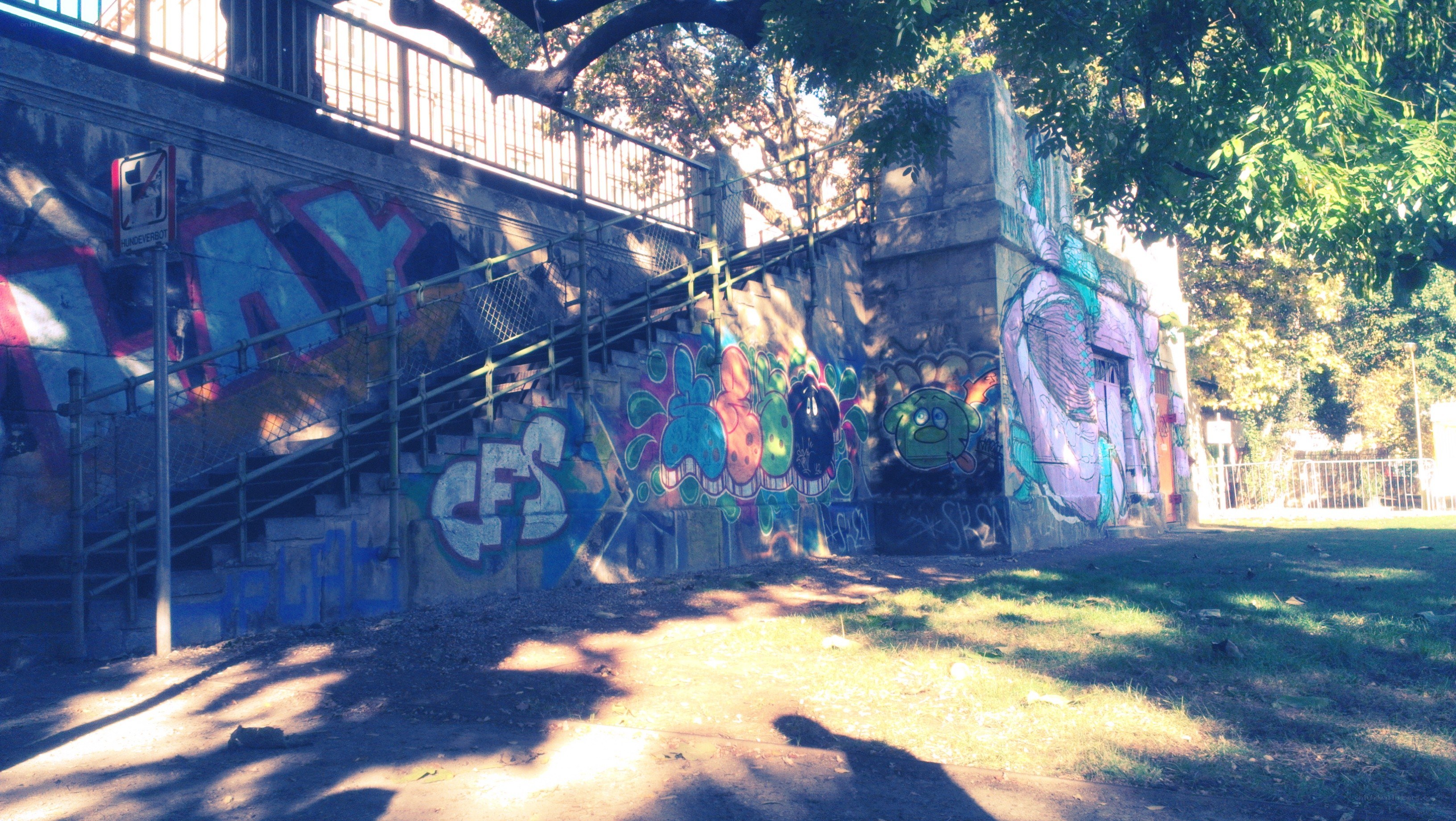 Graffiti-covered underpass stairs