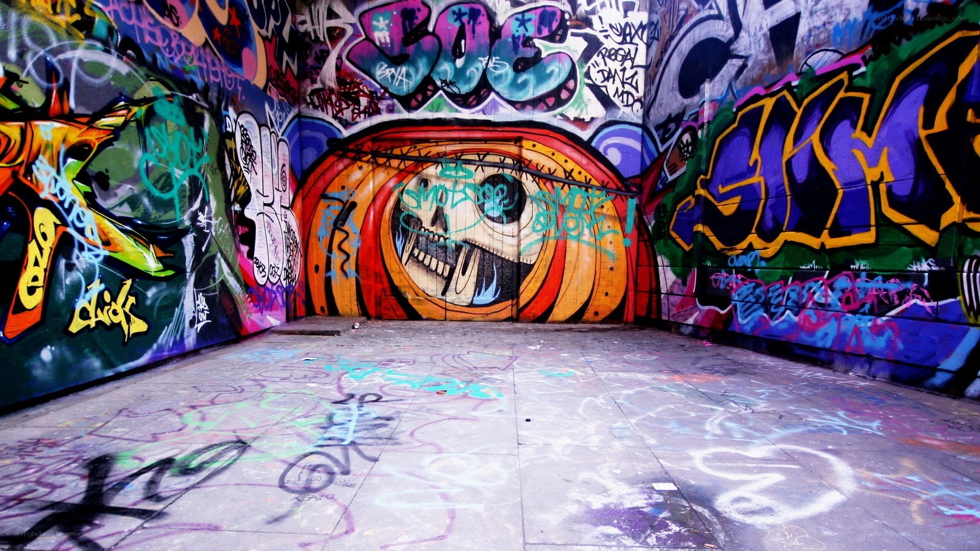 graffiti-covered urban tunnel
