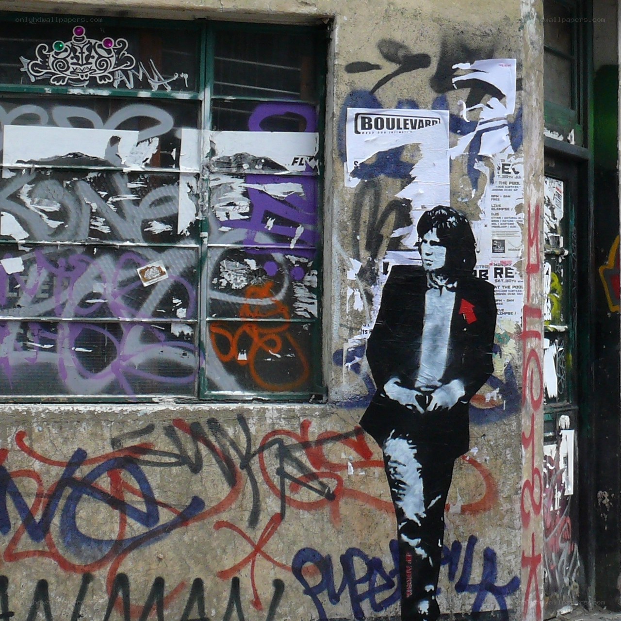 graffiti-covered urban wall