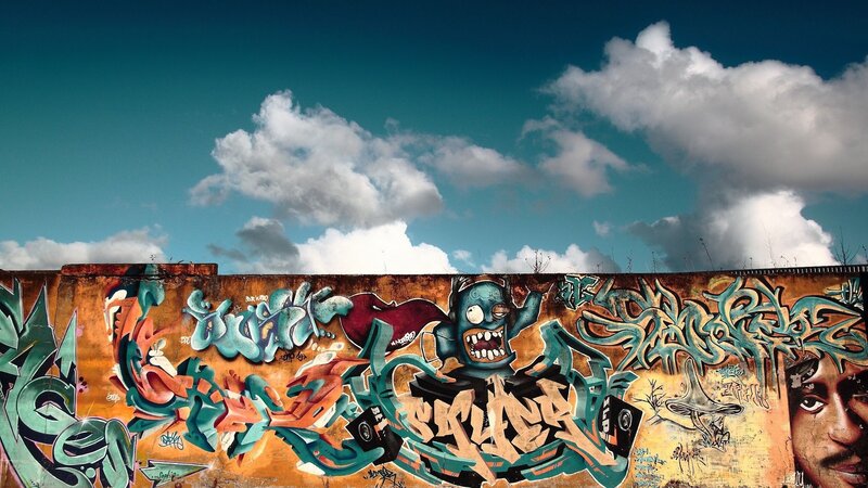 Graffiti-covered Wall — Blue, Dramatic, Afternoon, Photograph