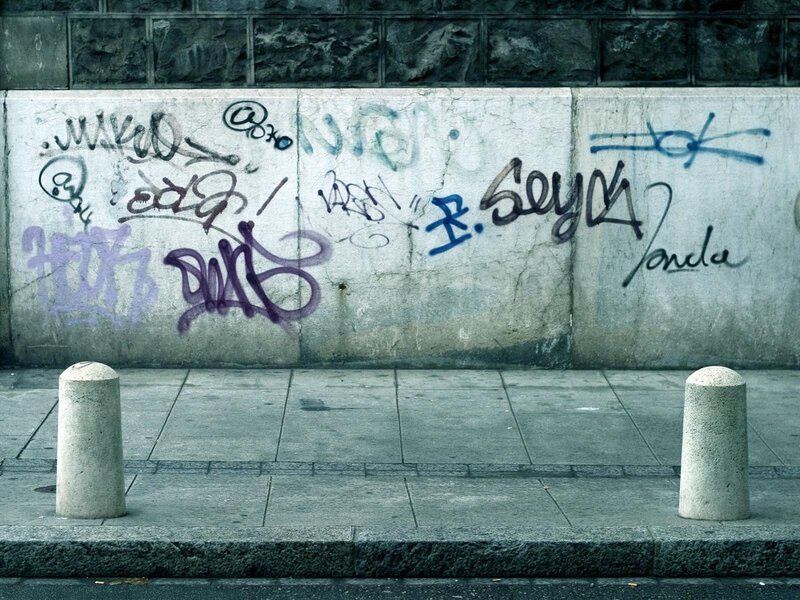 Graffiti-covered Wall — Gray, Dull, Photograph