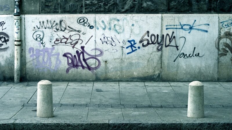 Graffiti-covered Wall — Gray, Dull