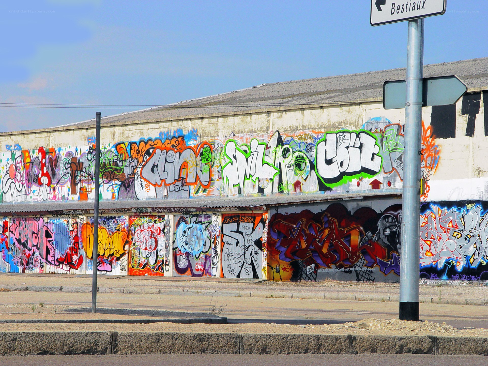 graffiti-covered wall in bestiaux