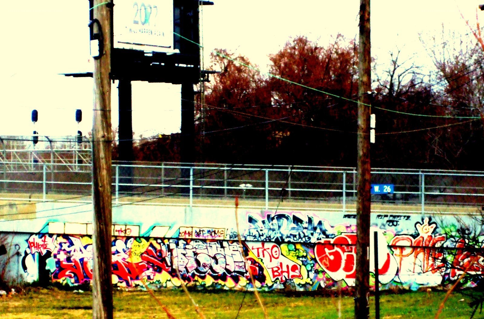 graffiti-covered wall near railway