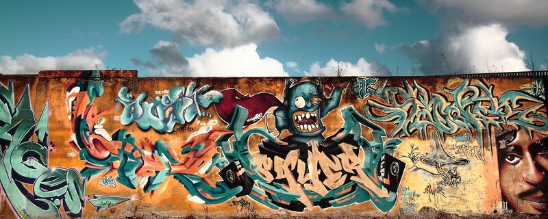 Graffiti-covered Wall — Orange