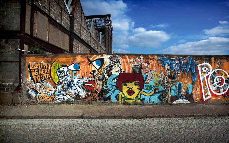 Graffiti-covered Wall — Orange, Vibrant