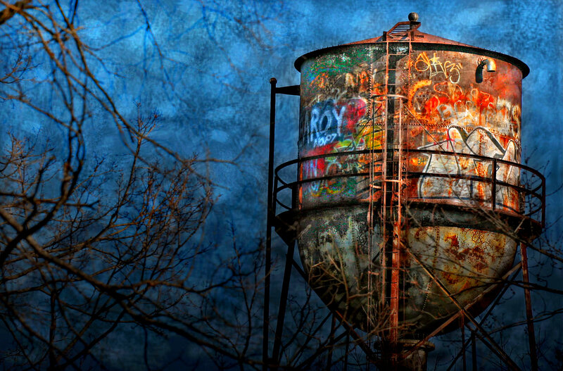 graffiti-covered water tower