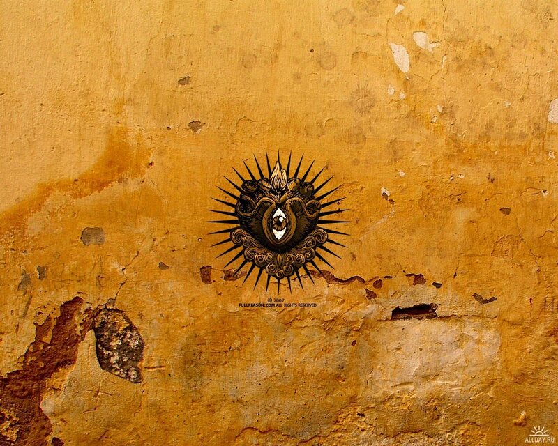 graffiti eye on yellow wall