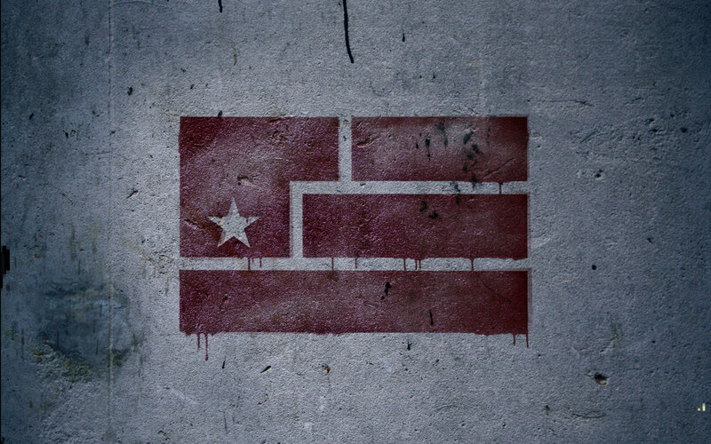 graffiti flag on concrete wall