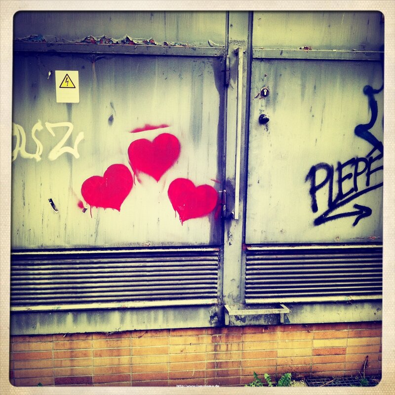 Graffiti hearts on a metal door