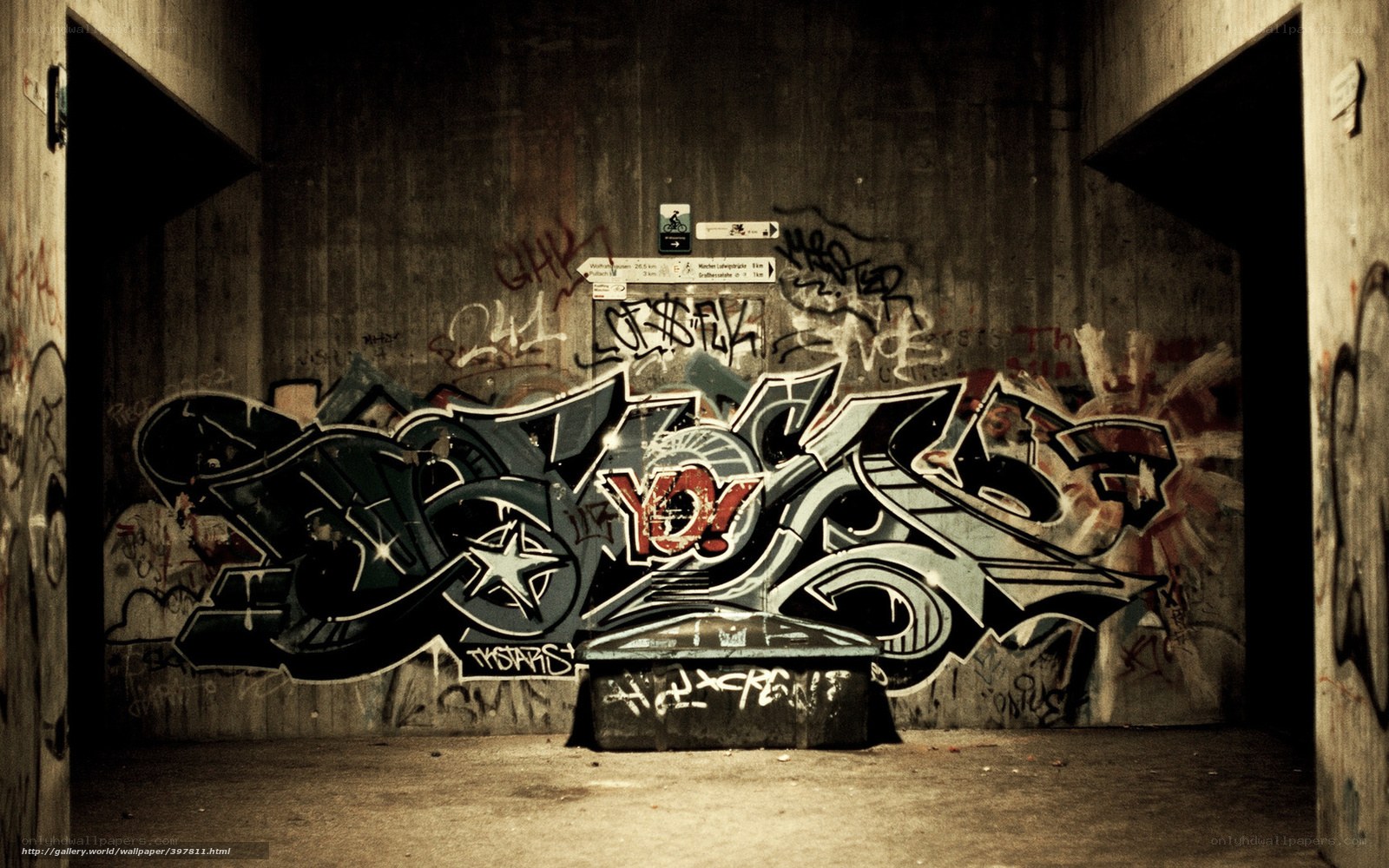 graffiti in concrete tunnel