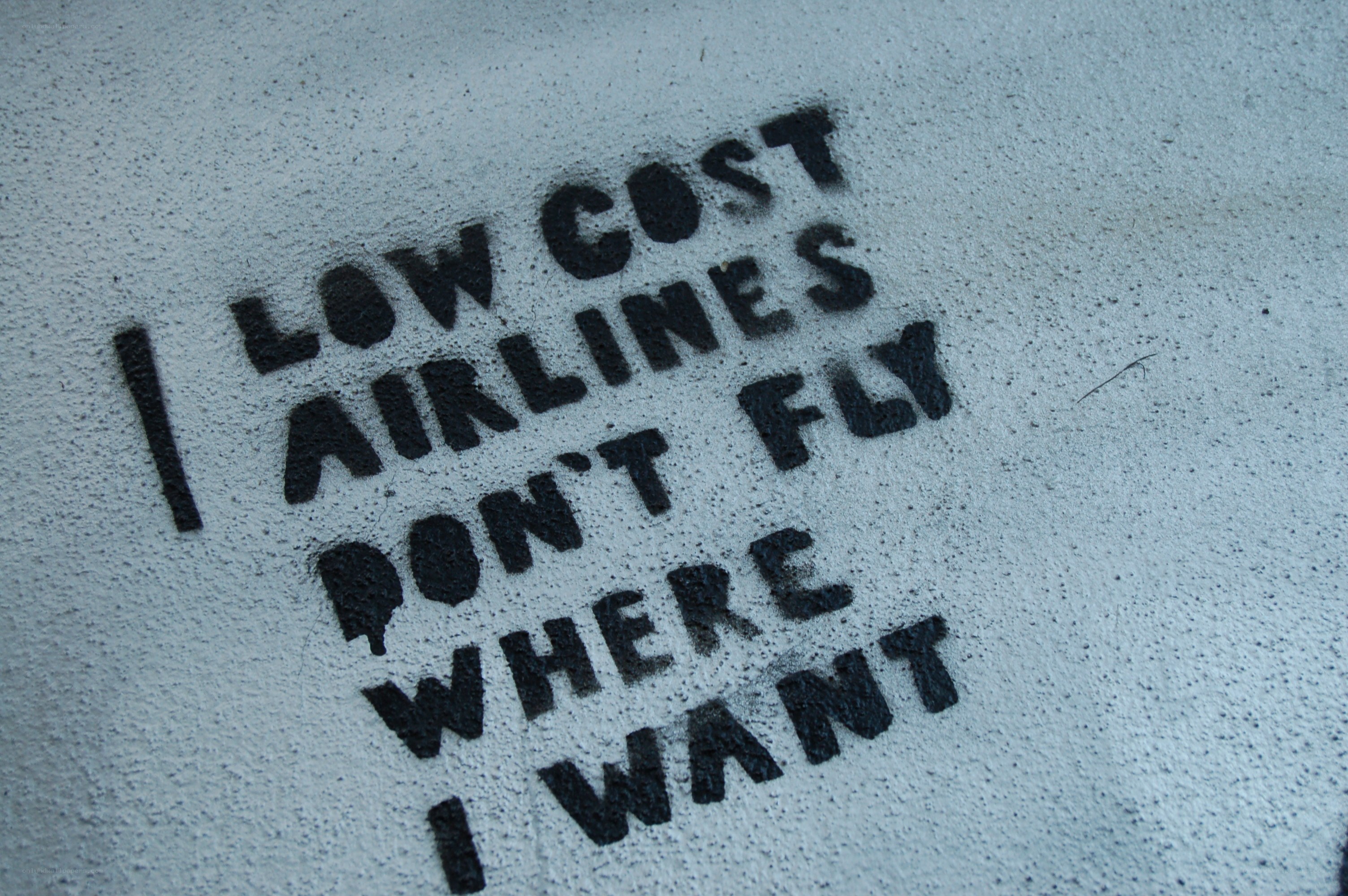 graffiti message about low-cost airlines