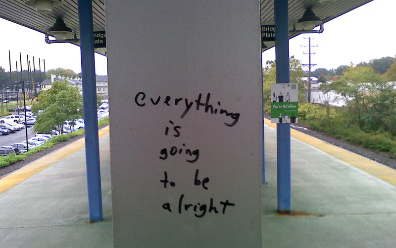 graffiti message at train station