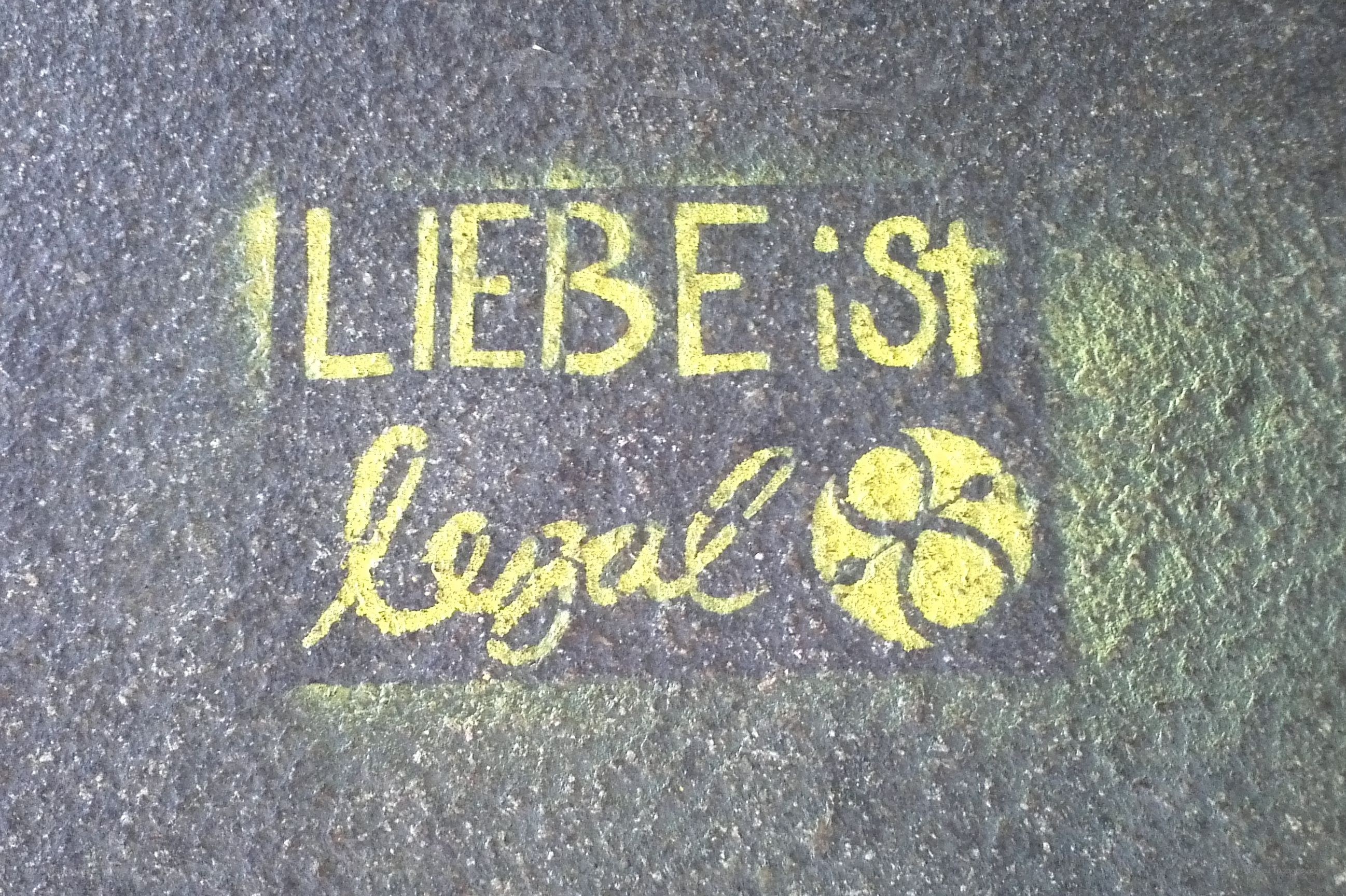 graffiti message on pavement