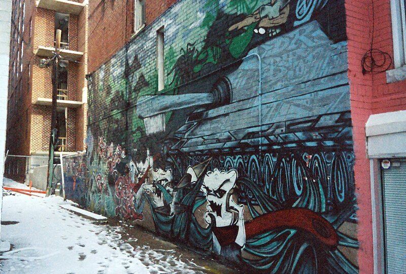 graffiti mural in snowy alley