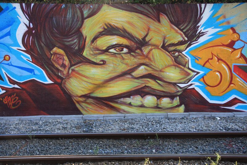 graffiti mural of angry face
