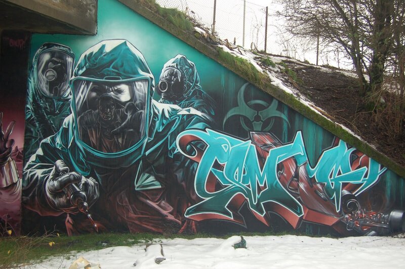 graffiti mural of hazmat workers