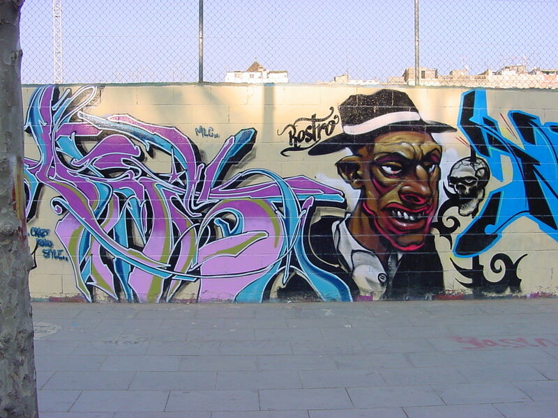 graffiti mural of man in hat