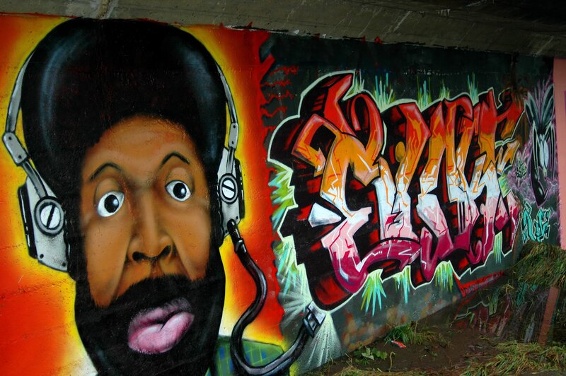 graffiti mural of man with headphones