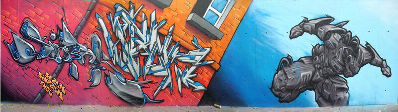 graffiti mural of robot and text