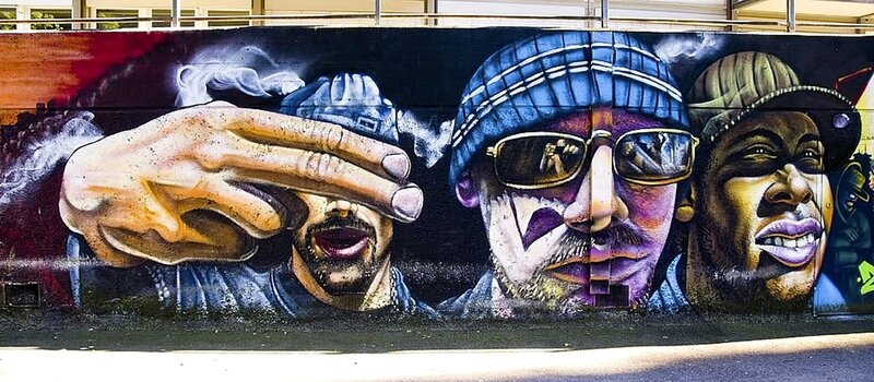 graffiti mural of three men