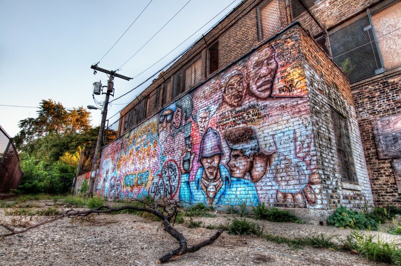 graffiti mural on brick wall