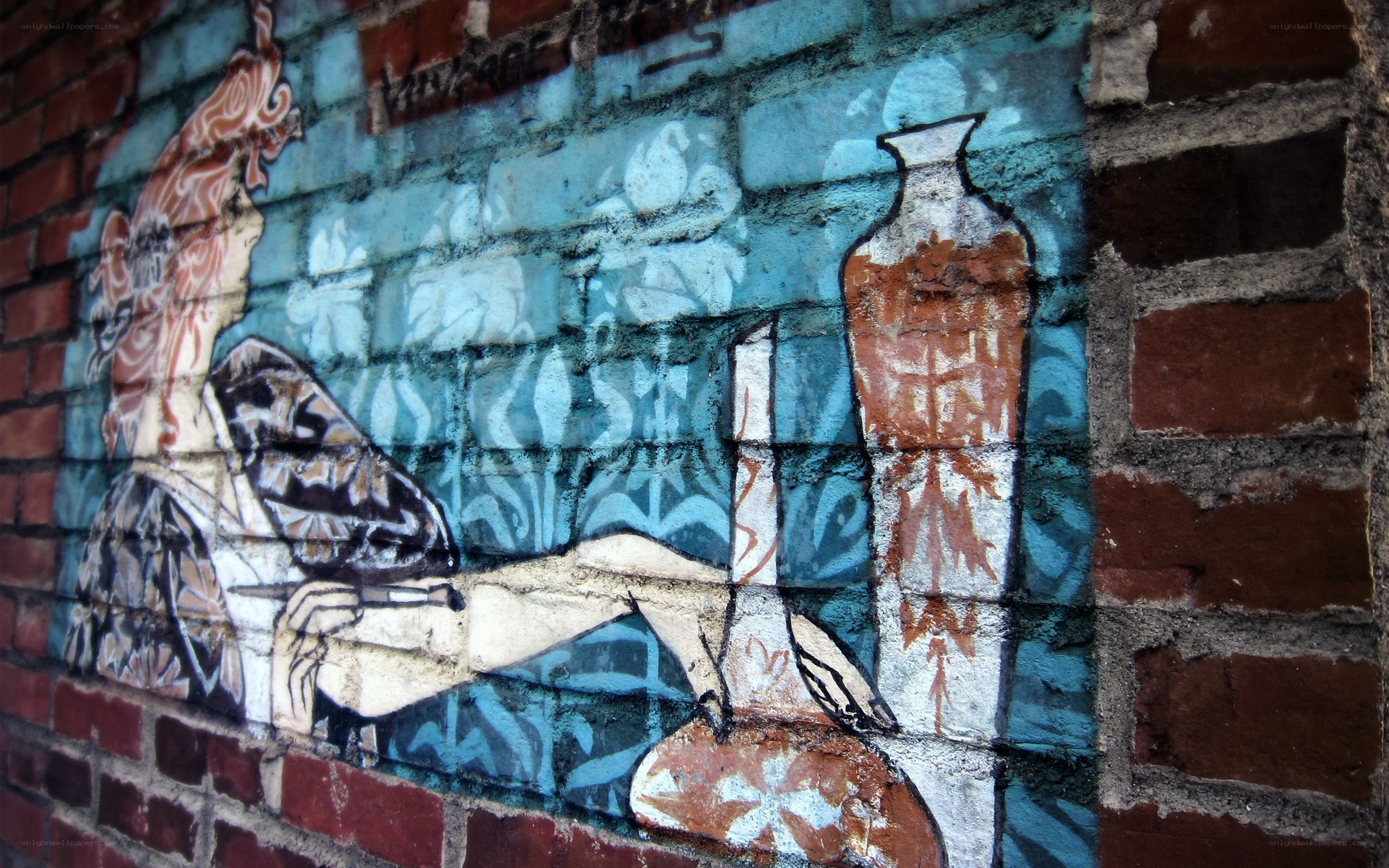 graffiti mural on brick wall