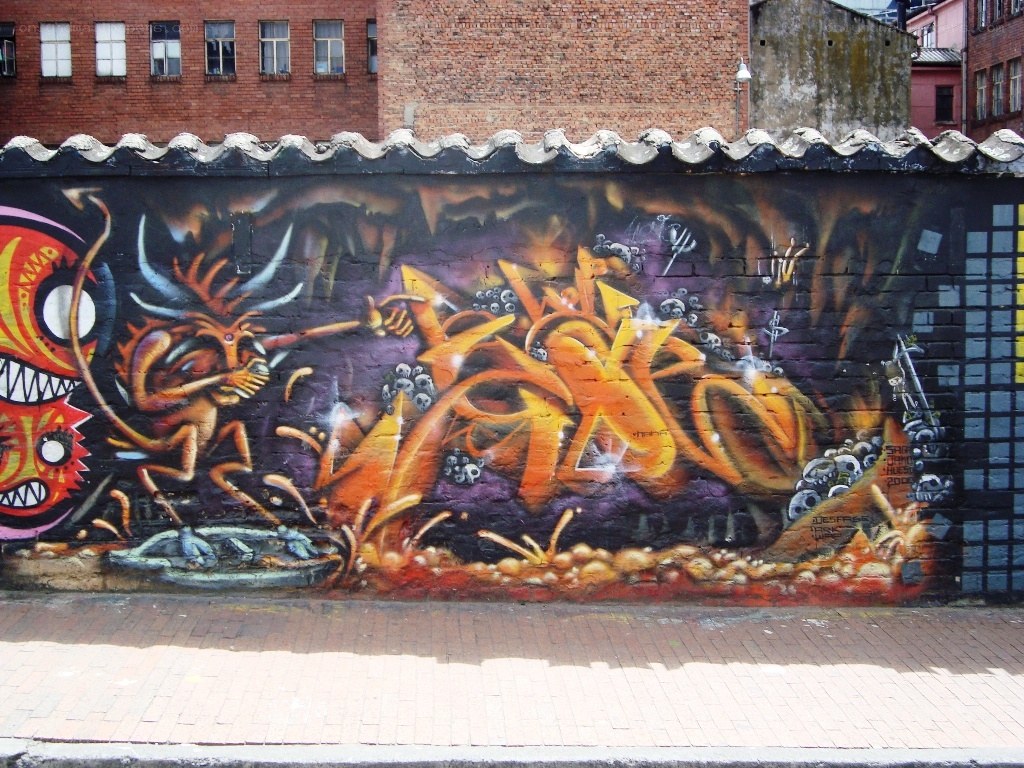graffiti mural on brick wall