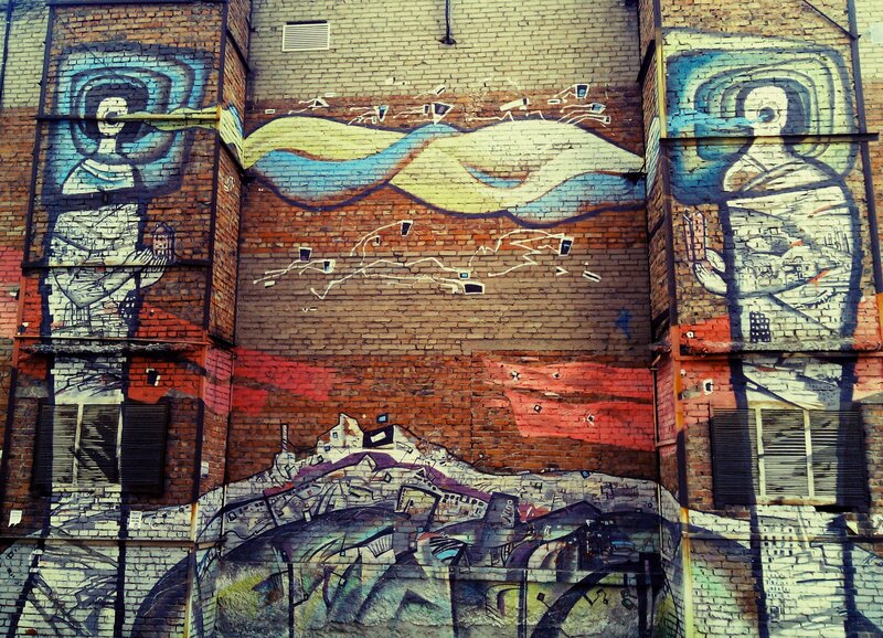 Graffiti Mural on Brick Wall — Blue