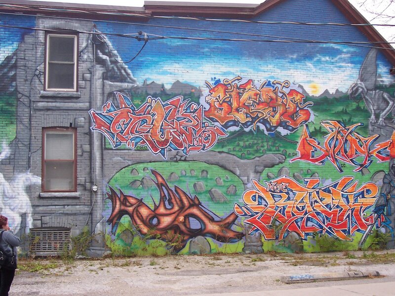 graffiti mural on brick wall