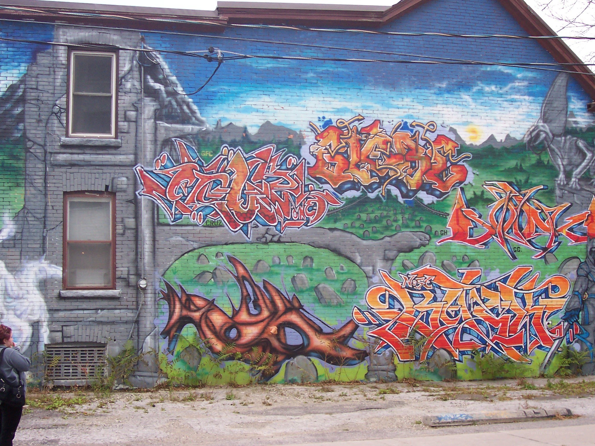 graffiti mural on brick wall
