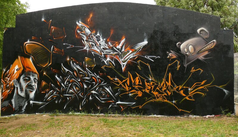 Graffiti Mural on Wall — Black, Dramatic, Afternoon