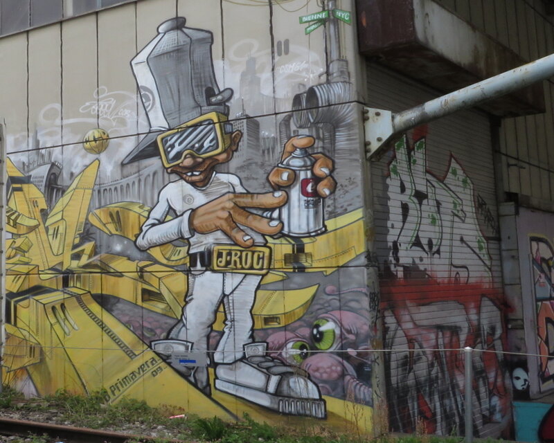 Graffiti Mural on Wall — Yellow