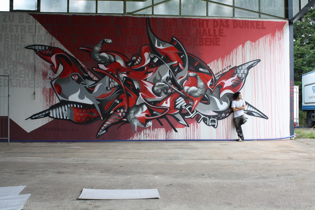 Graffiti mural with artist